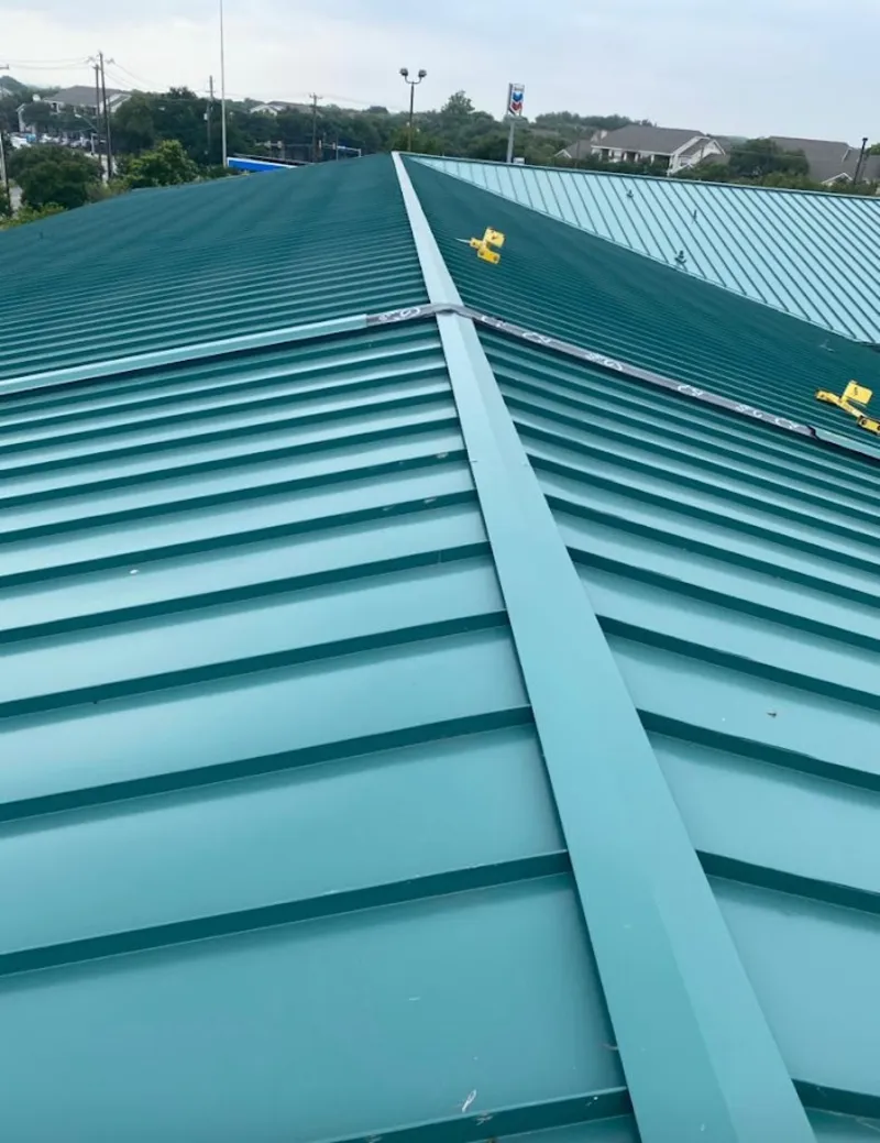 Green commercial metal roof ridge and valley for Metal Roof Repair in Manorhaven