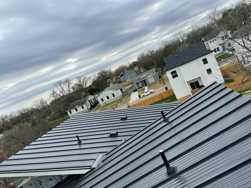 Standing seam metal roof panels with vents for Skylight Repair in Manorhaven